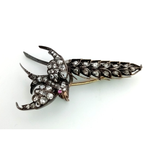 228 - 9K Yellow Gold Swallow Brooch set with old cut Diamonds and a ruby eye.
1.10ct Approx
weighs 5.9g