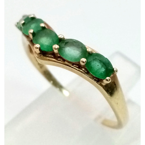 373 - A Green Emerald 10K Gold Gemstone Chevron Ring. Five stones. Size P/Q. 1.81g total weight.