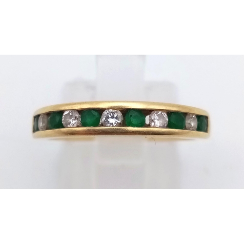 242 - 18k Yellow Gold Diamond and Emerald Channel set half eternity ring.
weighs 3.8g
size N