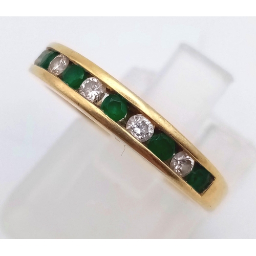 242 - 18k Yellow Gold Diamond and Emerald Channel set half eternity ring.
weighs 3.8g
size N