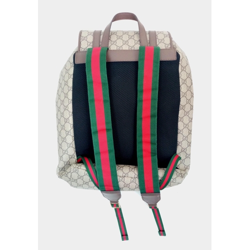 316 - A GUCCI FULL SIZE BACKPACK IN GOOD CONDITION