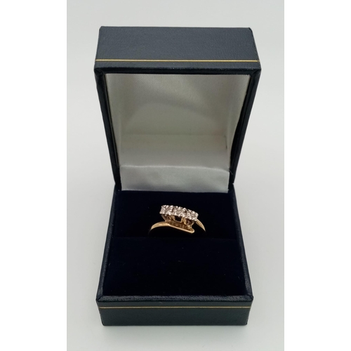 216 - A mid century star set diamond ring set in 9ct yellow gold, Ring Size N, Total Weight 2.8 grams.