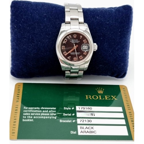 179 - A Rolex Oyster Perpetual Datejust Ladies Watch. Stainless steel strap and case - 26mm. Black hypnoti... 