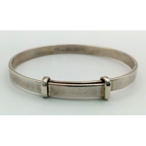 1000 - Sterling Silver Solid expanding bangle, weighs 21.3g