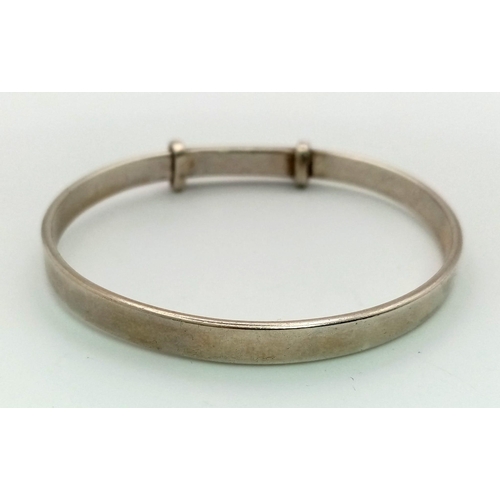 1000 - Sterling Silver Solid expanding bangle, weighs 21.3g