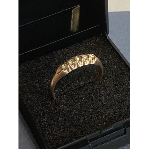 1050 - Continental 10 carat GOLD RING having clear stone sweep set to top.
1.43 grams. Size Q 1/2.