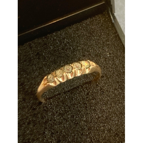 1050 - Continental 10 carat GOLD RING having clear stone sweep set to top.
1.43 grams. Size Q 1/2.