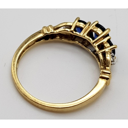 1062 - 9K Yellow Gold Diamond and 3 Blue Stone Ring.
Weighs 2.24g
Size N