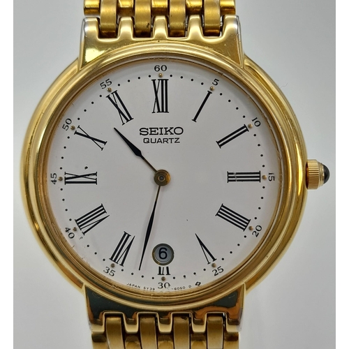 1126 - A Gilded Seiko Quartz Ladies Watch. Case -34mm. White dial with date window. In good condition and w... 