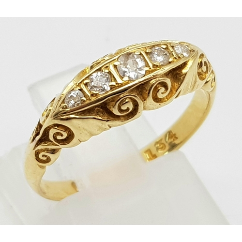 115 - AN 18K GOLD RING WITH 5 DIAMONDS SET IN VINTAGE STYLE SETTING.  4.4gms  size N