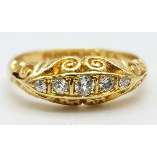 115 - AN 18K GOLD RING WITH 5 DIAMONDS SET IN VINTAGE STYLE SETTING.  4.4gms  size N