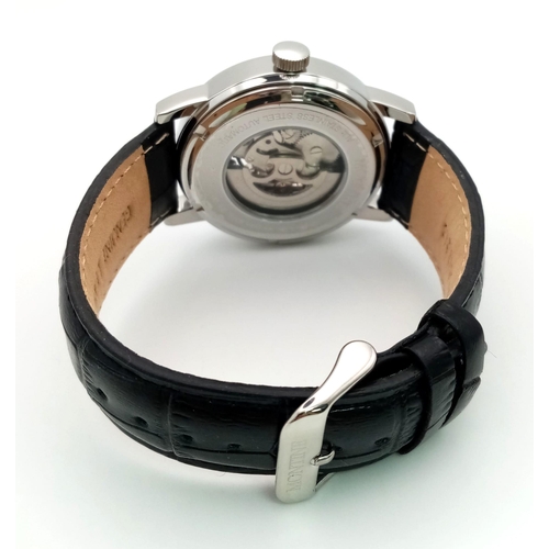 1381 - A Montine Automatic Gents Skeleton Watch. Black leather strap. Case - 45mm. In good condition and wo... 