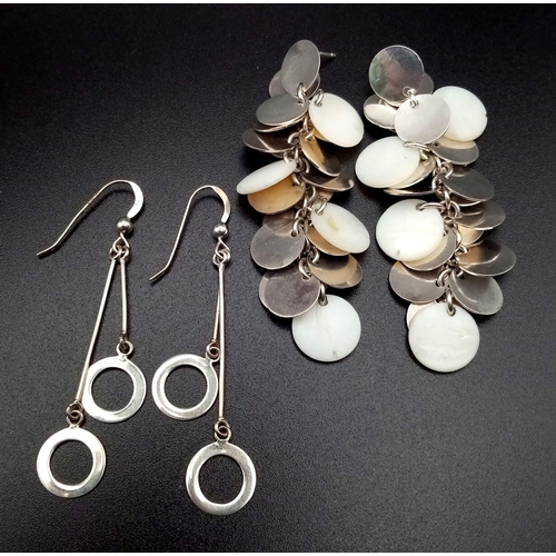 1406 - 2 Sterling Silver drop earrings. Weighs 20.3g