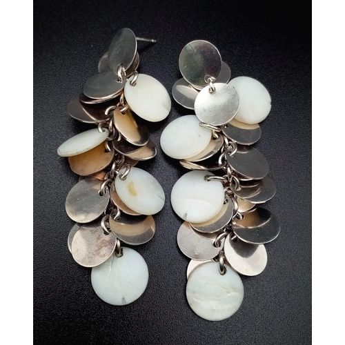 1406 - 2 Sterling Silver drop earrings. Weighs 20.3g