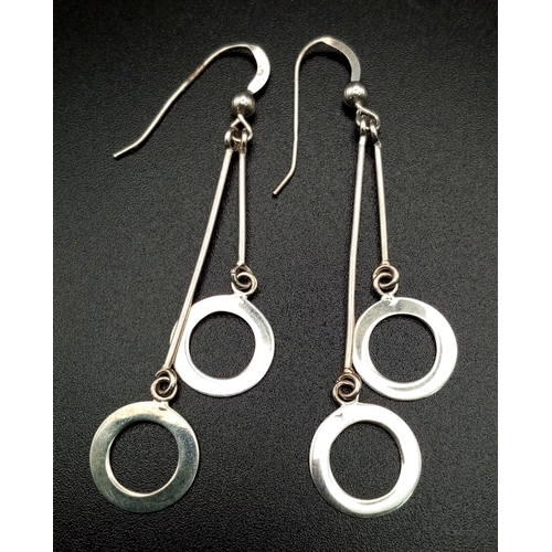 1406 - 2 Sterling Silver drop earrings. Weighs 20.3g