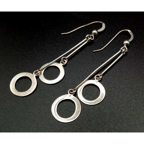 1406 - 2 Sterling Silver drop earrings. Weighs 20.3g