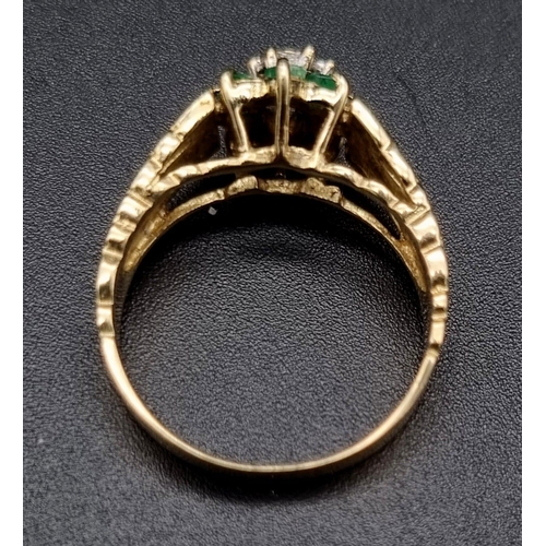 327 - A classic mid century diamond and emerald cluster ring. set in 9K yellow gold, Ring Size O, Total We... 