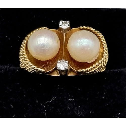 405 - A 18k Yellow Gold Pearl and Diamond Ring. 8mm Pearls Set in a Basket Shape Ring with Two Central Set... 