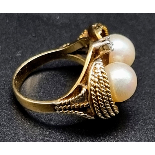 405 - A 18k Yellow Gold Pearl and Diamond Ring. 8mm Pearls Set in a Basket Shape Ring with Two Central Set... 