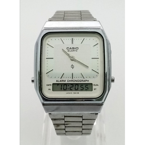 949 - A Vintage Casio Digital Alarm Chronograph Watch. Stainless steel strap and case - 32mm. Analogue/dig... 