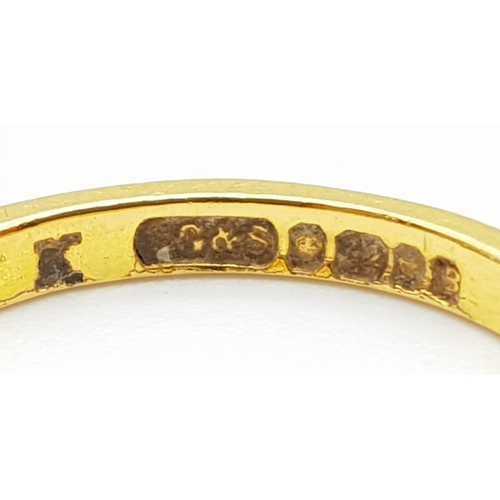 702 - A 22K Yellow Gold Band Ring. Size K. 2.31g.