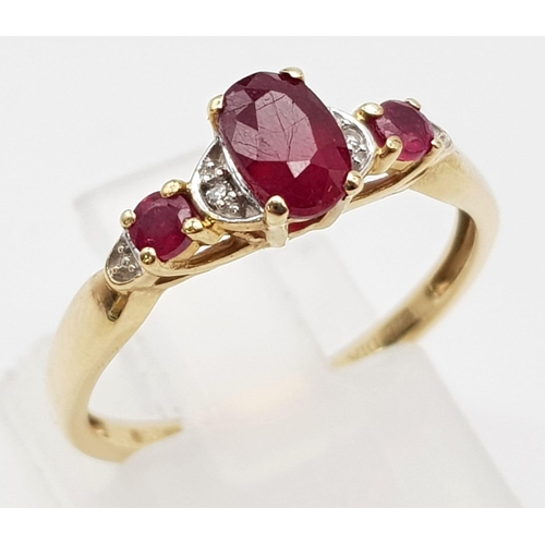 1138 - 9K Yellow Gold Diamond and Ruby Ring.
Weighs 1.7g
Size M