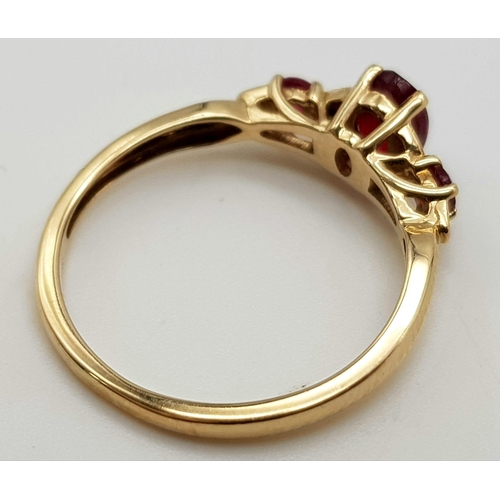 1138 - 9K Yellow Gold Diamond and Ruby Ring.
Weighs 1.7g
Size M