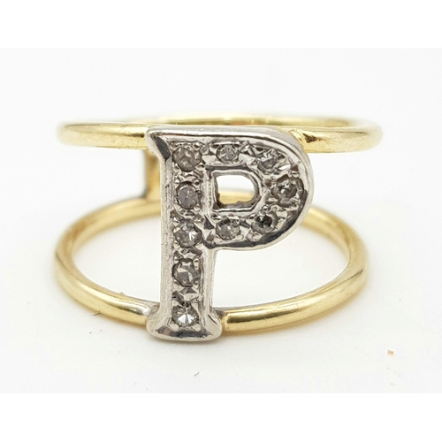 1188 - A 9K yellow gold ring with a white gold, diamond set letter P. Ring size: F, weight: 2 g.