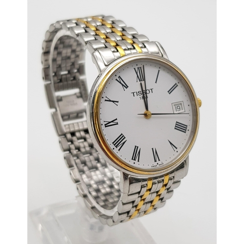 1374 - A Tissot Quartz Gents Watch. Two-tone stainless steel strap and case - 34mm. White dial with date wi... 