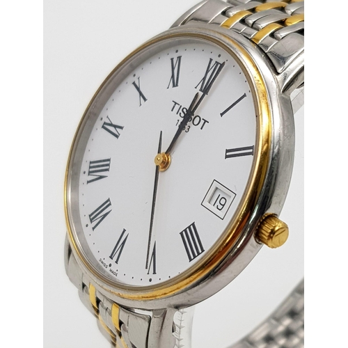 1374 - A Tissot Quartz Gents Watch. Two-tone stainless steel strap and case - 34mm. White dial with date wi... 