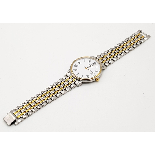 1374 - A Tissot Quartz Gents Watch. Two-tone stainless steel strap and case - 34mm. White dial with date wi... 