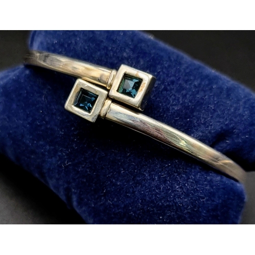 1551 - Sterling Silver Blue Stone set Bangle.
weighs 8g