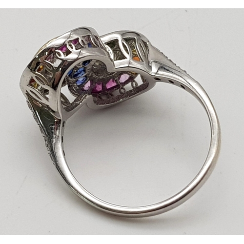 163 - A FABULOUS 18K WHITE GOLD DIAMONDS AND GEMSTONE RING WITH A .22 AND .21 E/VS2 TRIPLE EXCELLENT DIAMO... 