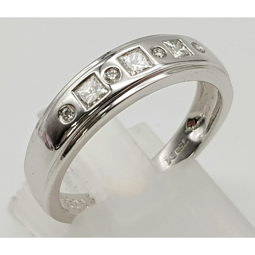 563 - 18k White Gold Diamond band ring 
0.25ct Diamond
Weighs 3.4g
Size n1/2