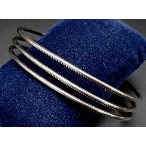 1007 - Sterling Silver 3 row cuff bangle.
weighs 23.8g