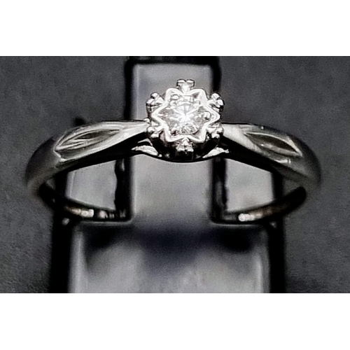 1041 - 9K White Gold Diamond Solitaire Ring
Weighs 1.3g
Size N