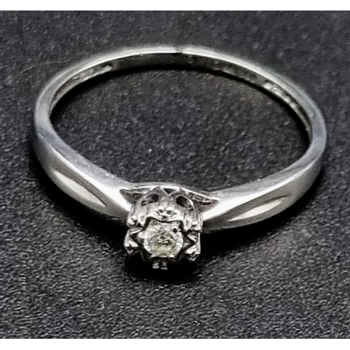 1041 - 9K White Gold Diamond Solitaire Ring
Weighs 1.3g
Size N