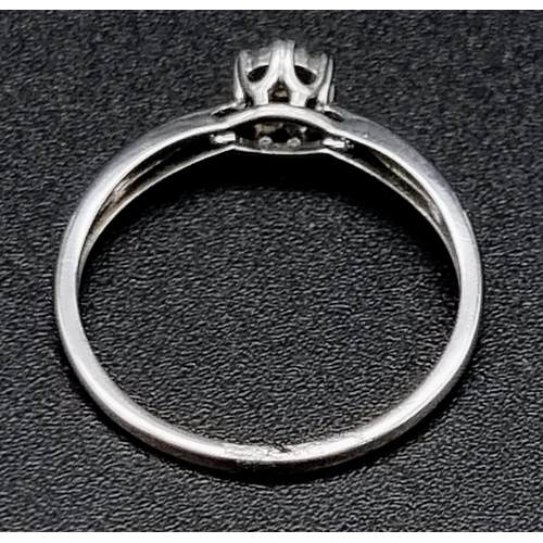 1041 - 9K White Gold Diamond Solitaire Ring
Weighs 1.3g
Size N