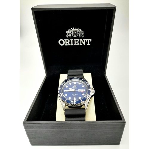 1284 - An Orient Automatic Gents watch. Black rubber strap. Stainless steel case - 40mm. Blue dial with day... 