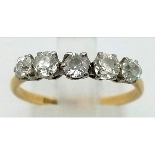 19 - A vintage, 19 K yellow gold and platinum ring with five rose cut diamonds (0.90 carats). Ring size: ... 