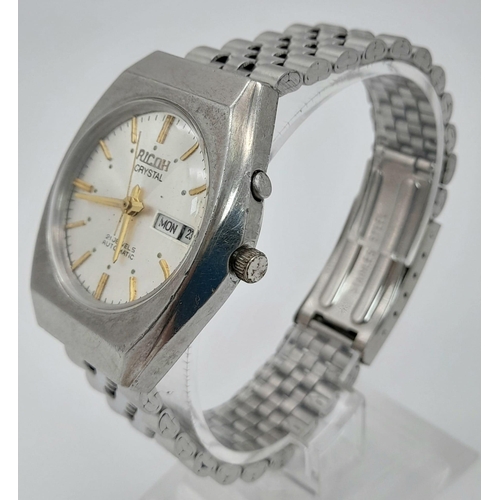 481 - A Vintage Ricoh 21 Jewel Automatic Gents watch. Stainless steel strap and case - 36mm. Silver tone d... 