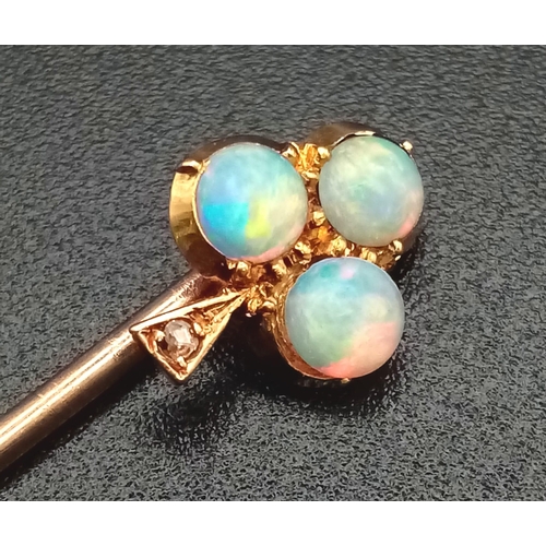 796 - A Victorian 15K Gold and Opal Trefoil Stickpin. 5.5cm. 1.1g total weight