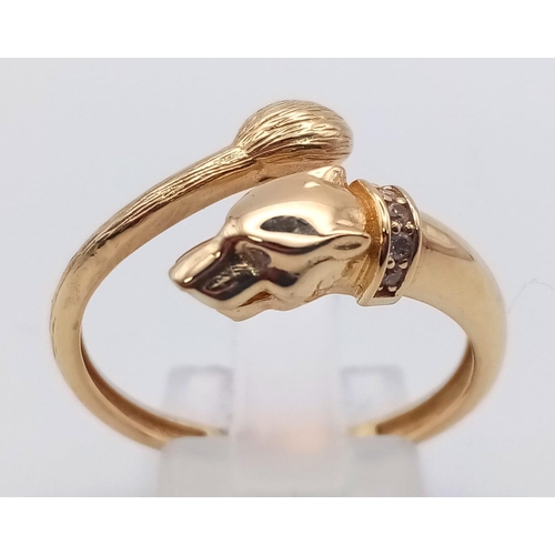 913 - A 14K yellow gold, diamond set, panther ring. Size: R, weight: 3 g.