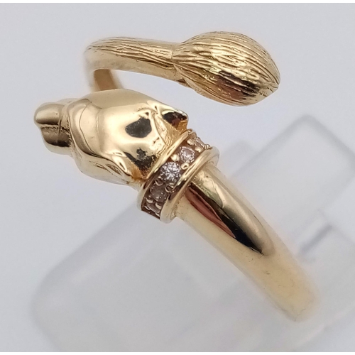 913 - A 14K yellow gold, diamond set, panther ring. Size: R, weight: 3 g.