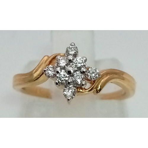 1304 - An 18K yellow gold, diamond (0.15 carats) cluster ring. Size: E, weight: 2.1 g.