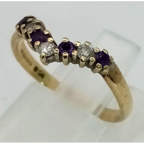 1331 - A 9K yellow gold ring with a diamond and amethyst wishbone design. Ring size: K, weight: 1.4 g.