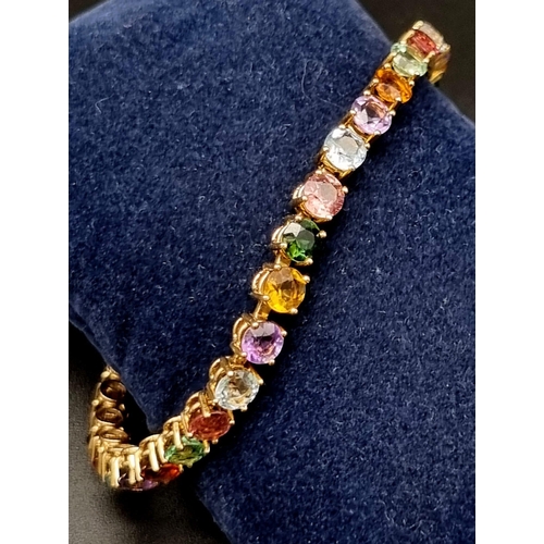 258 - 16k Yellow Gold Multi Gem Set Bracelet. Weighs 12.7g