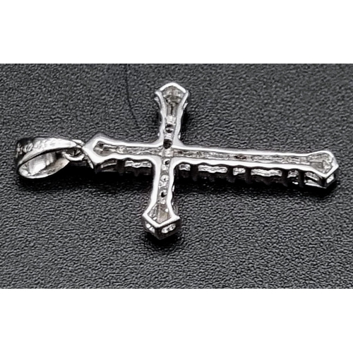 508 - 18k White Gold Diamond set Cross 
0.24ct Diamond 
Weighs 1.7g
3cm in height