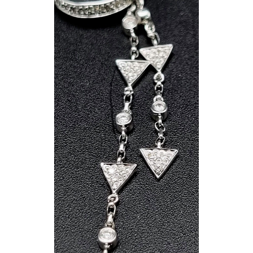 584 - 18k White Gold Diamond Drop Earrings Weighs 6.4g