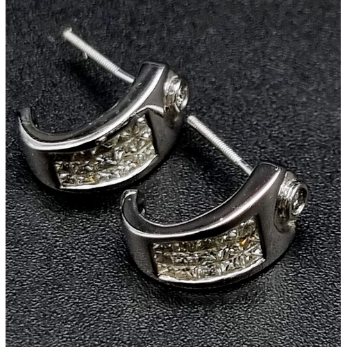 772 - 14K White Gold Diamond Stud Earrings 
0.40ct Diamonds
weighs 2.8g